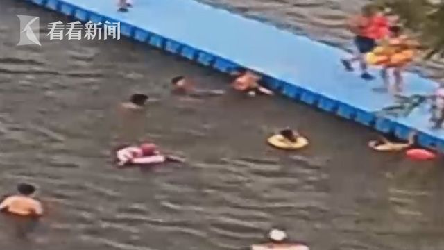 3岁男孩落水其父一旁玩手机市民跳湖12秒救人