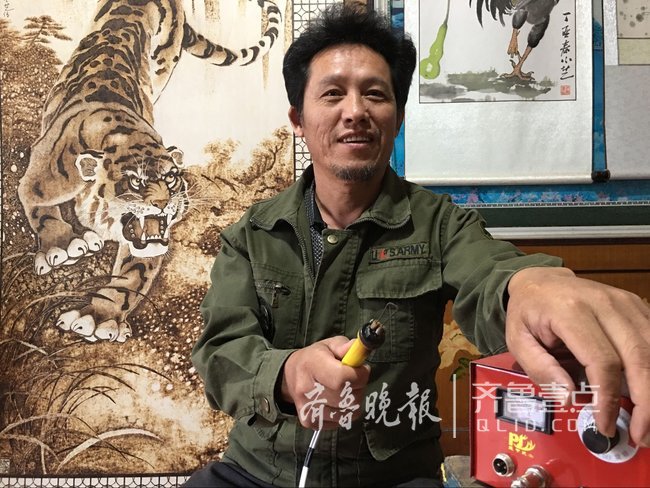 胶州杀猪匠用烙铁作画 一幅虎图售出1.8万元