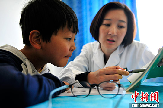中国整合城乡医保制度 适当提高个人缴费比重