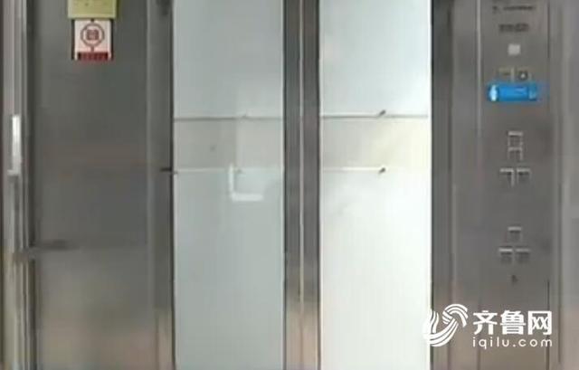 青岛老楼装电梯首个试点选方案 每户掏几千块