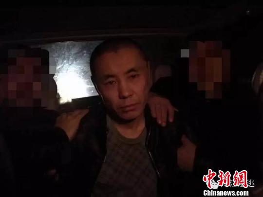 犯罪嫌疑人李振忠被警方抓获 钟欣 摄