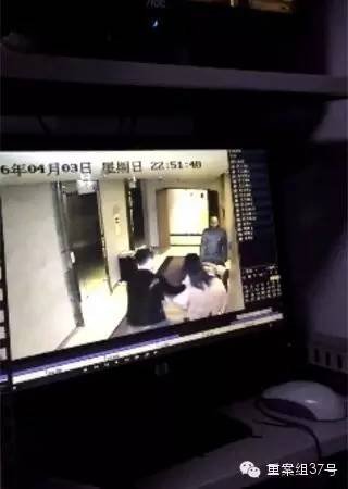 一女子在酒店被陌生男子拖拽。 视频截图
