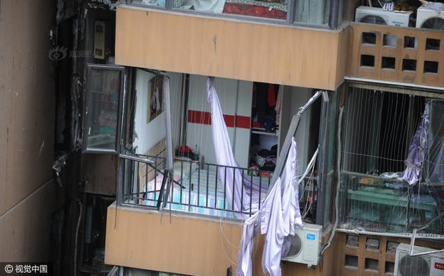 小区突发爆炸 女租户被炸下5楼上身赤裸(图)