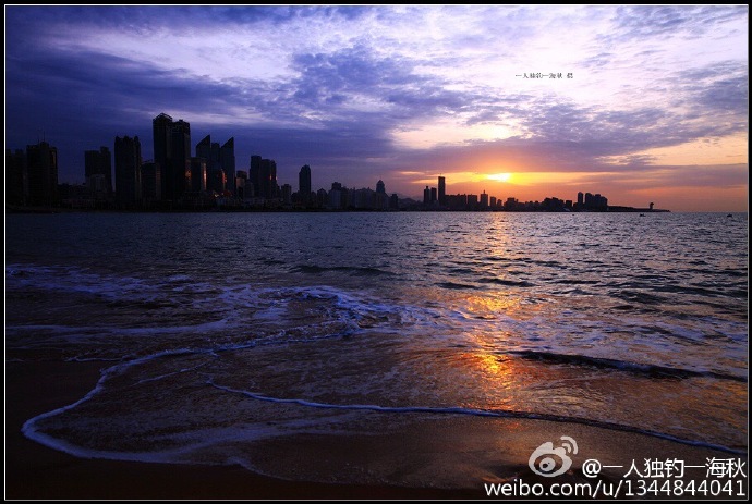 高清：青岛海边惊现绝美日出 如画美景引人驻足