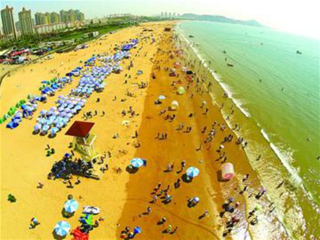 洗海澡喽!青岛海水浴场周五全开放 停车场扩建