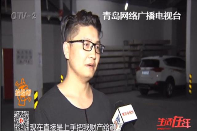 业主地下车库内爱车被砸 错停车位惹祸？(图)