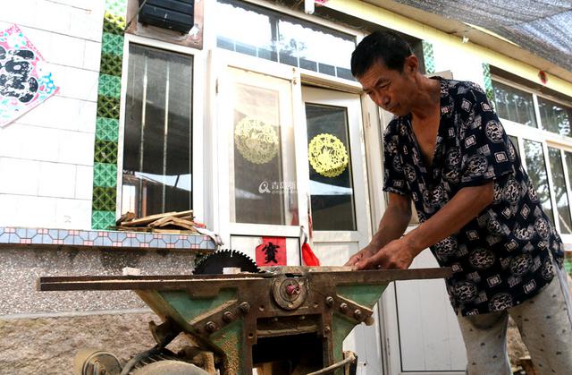 红岛渔民手工造古船模型：给多少钱都不卖(图)