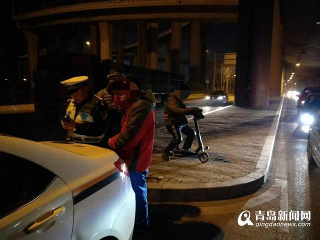 平安夜青岛查获84名酒司机 查车现场演'跑男'