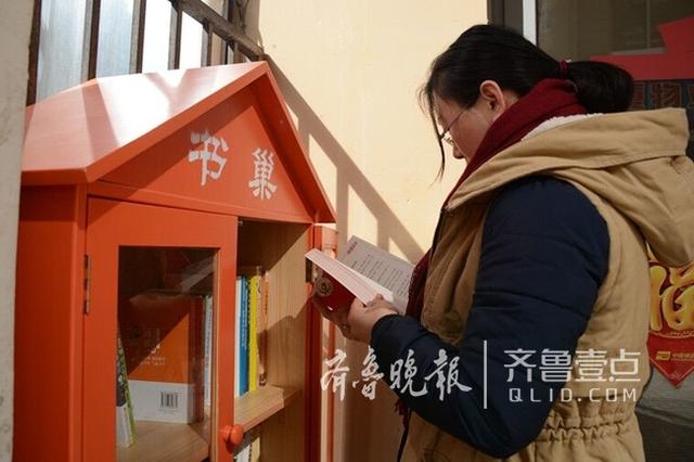 一市民家门口设书巢 小区内免费分享闲置图书