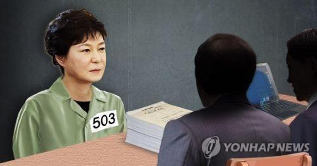 朴槿惠在看守所接受讯问。来源:韩联社。