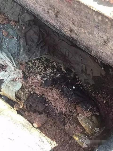 江西挖出明代古墓：棺内女尸完好 还流出清水